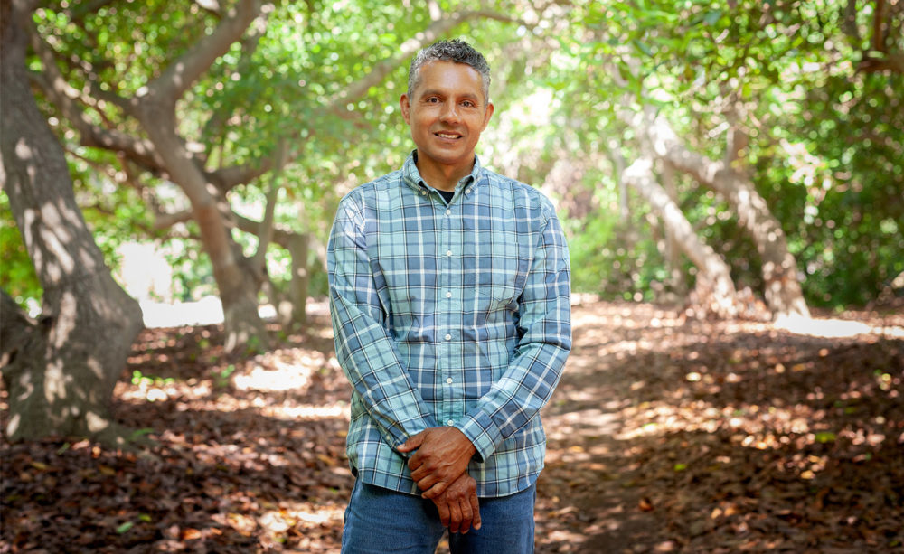 Man in fields for Calavo Avocados.