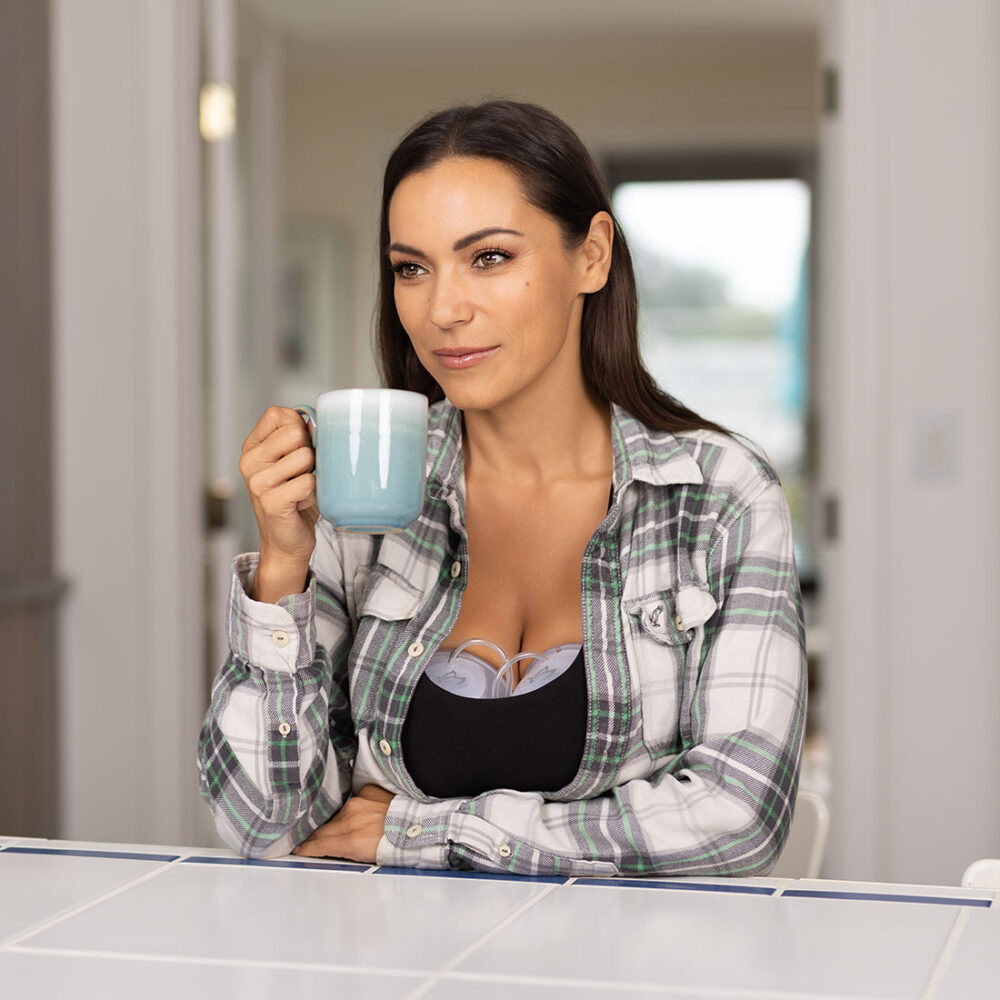 Lifestyle image for Baby Buddha breast pump brand.